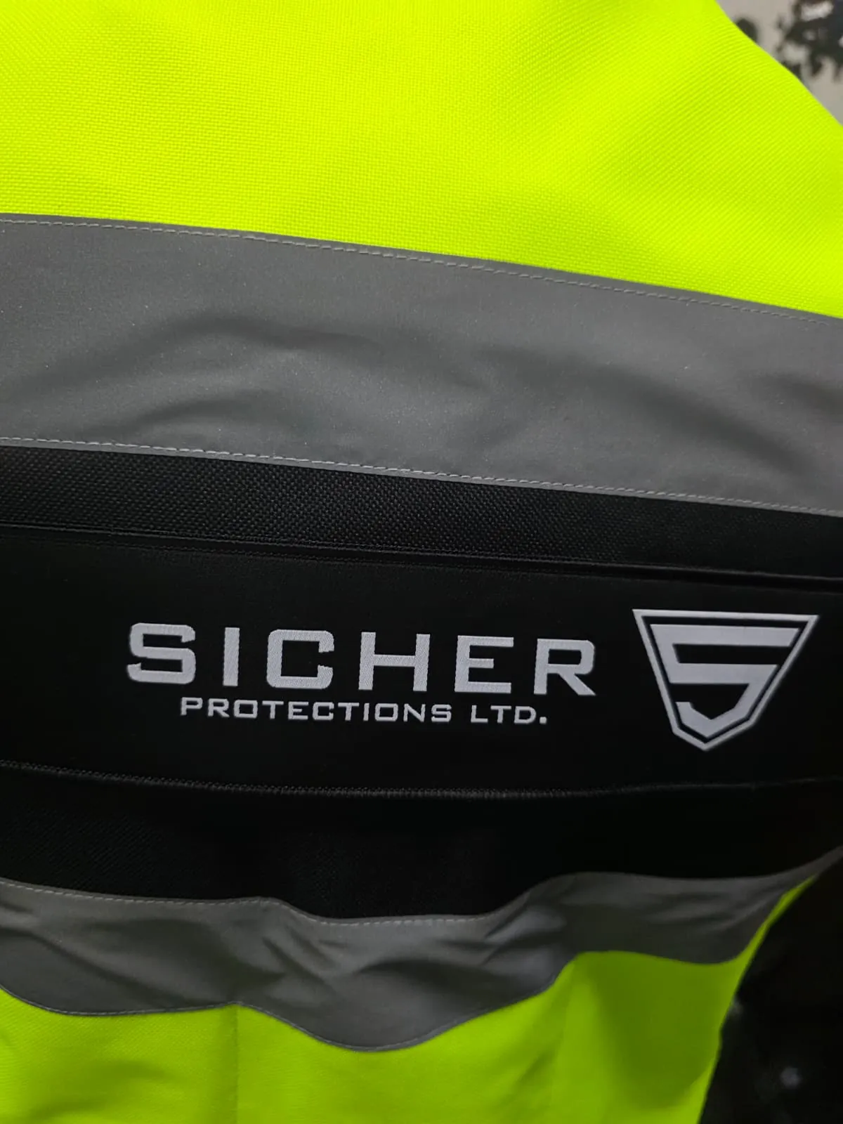 Sicher Protections logo stitched on the VestPro chest panel